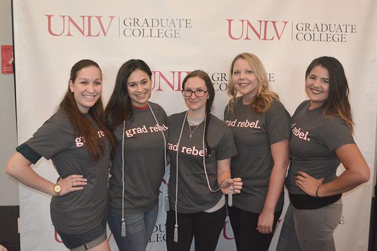 Group of women posing for a picture