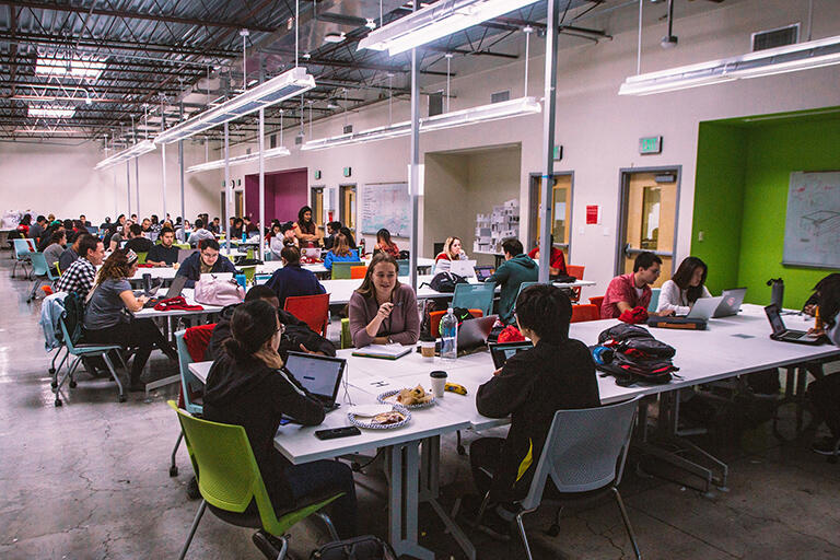 Students sitting down at desks.