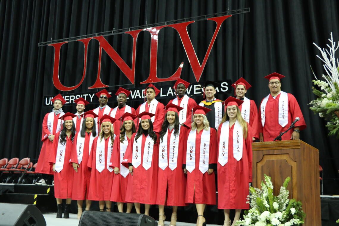 Group of graduates standing on stage