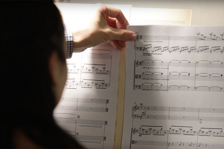 Person viewing sheet music