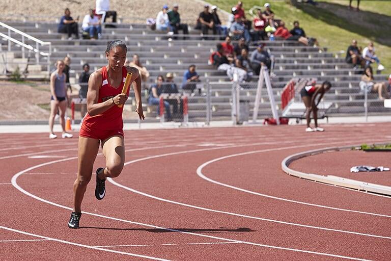 Athlete running on track