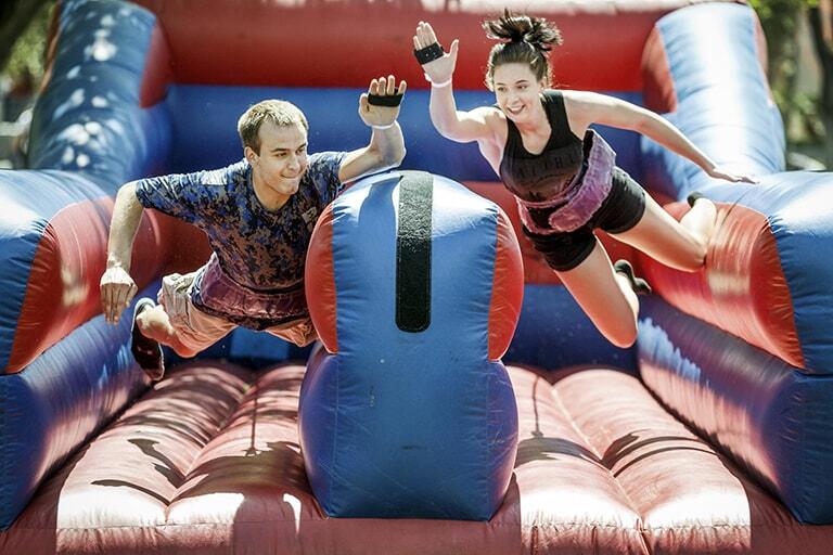 Two students on an obstacle course.