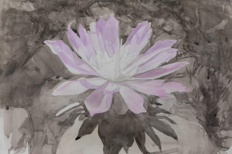 Painting of a flower on a rock