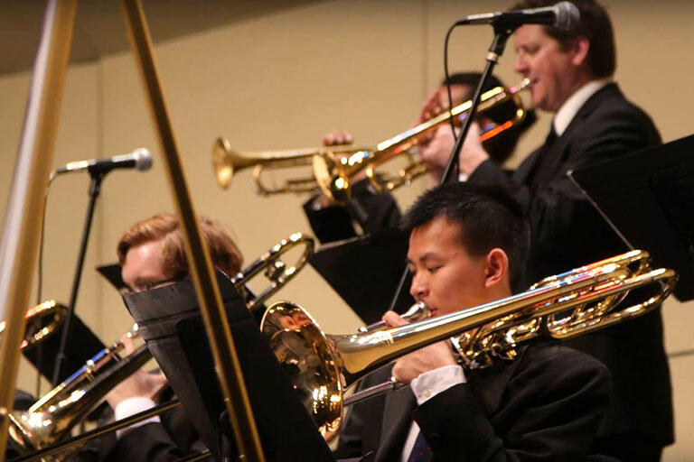 Students playing trumpets