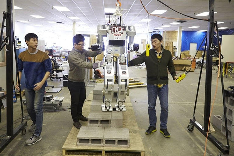Students working on a robot