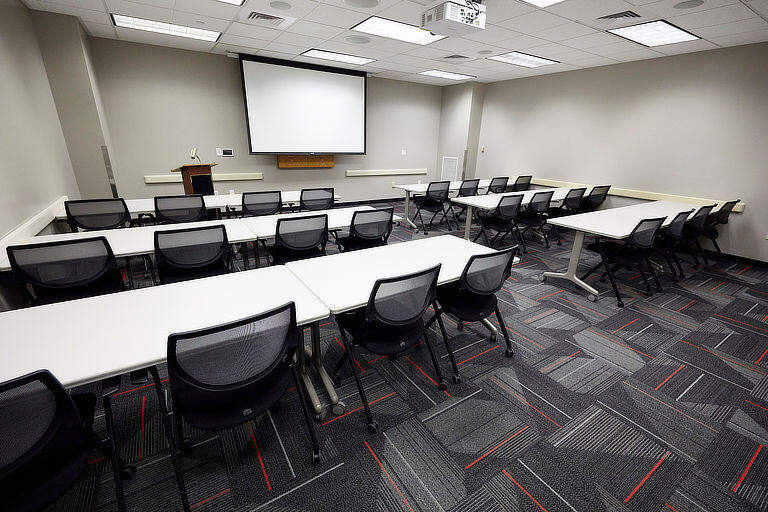 An empty classroom is pictured