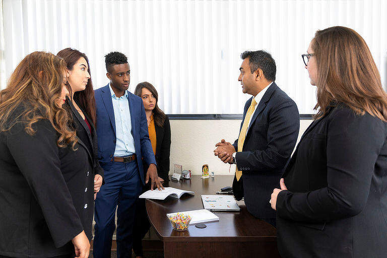 Employees gather to discuss plans
