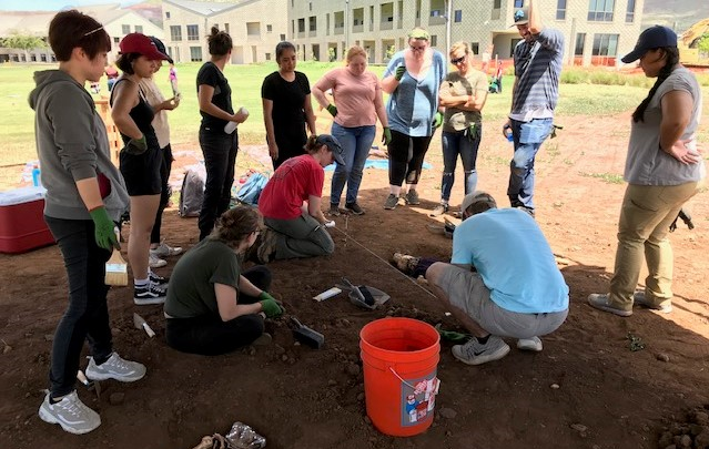 Students digging