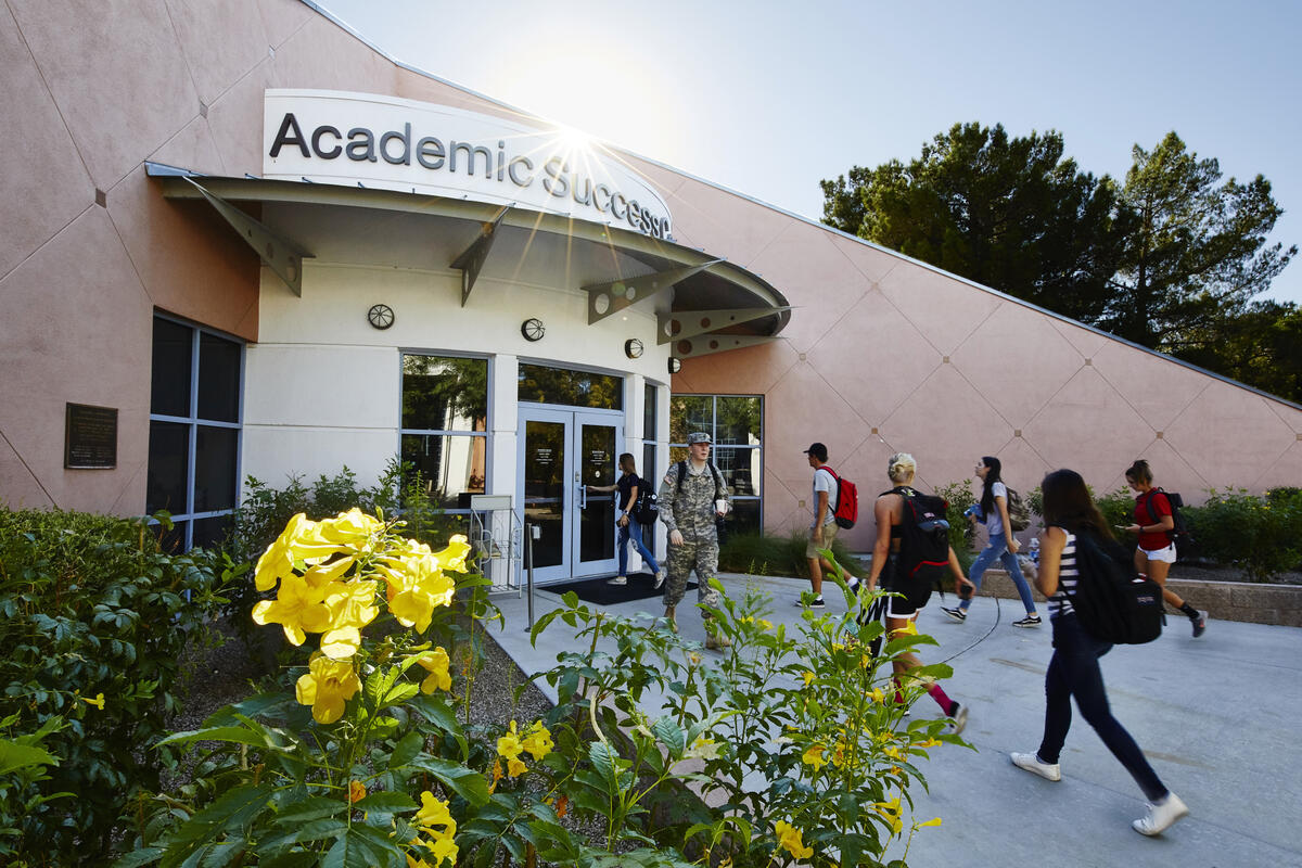 students walking into building