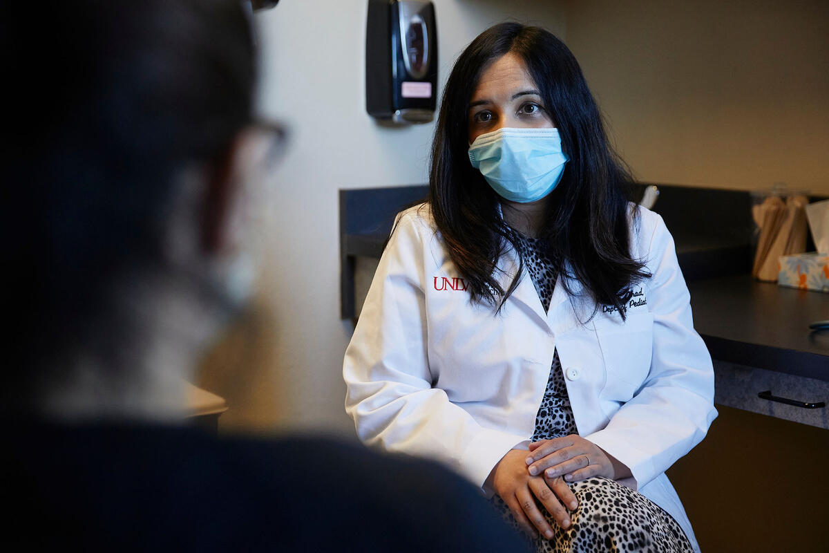 doctor talking to patient