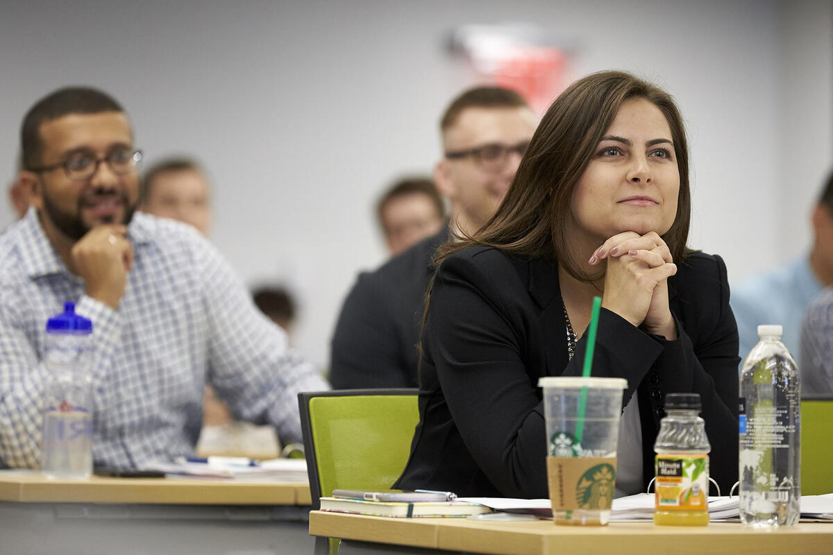 Ginger Christian seen seated in a classroom setting