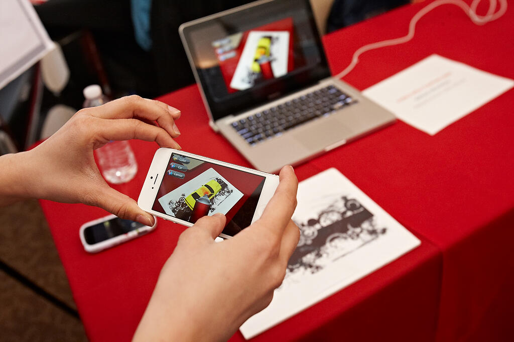 Mobile Spray Painting App: Mikhak Misaghian developed a mobile app that simulates spray painting on a virtual 3D object. The app can be used as a game or a spray paint simulator. It allows allow a user to practice with precision or paint companies to show customers sample paint colors. First place in the computer science category.