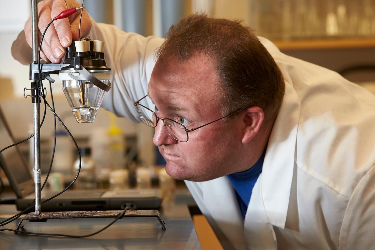 Biochemistry professor David Hatchett in his lab