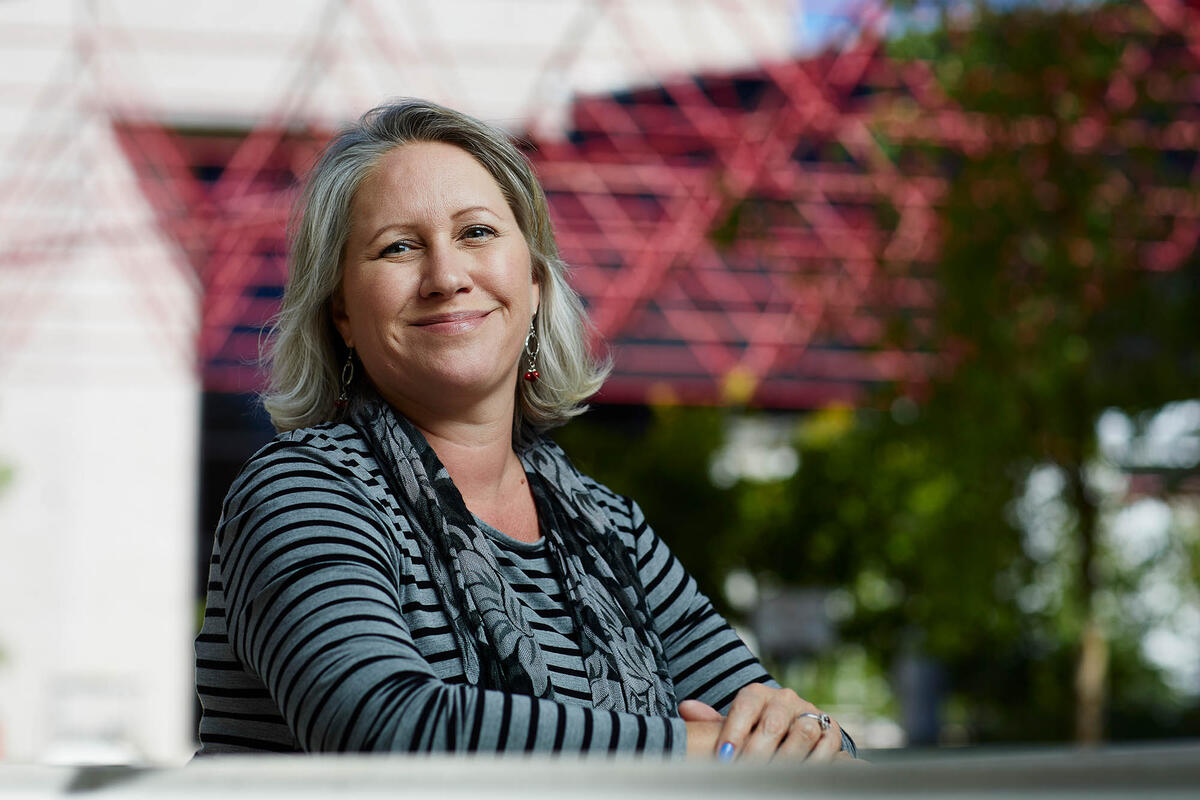 Meagan Madriaga-Hopkins a Professional Writing Consultant poses.