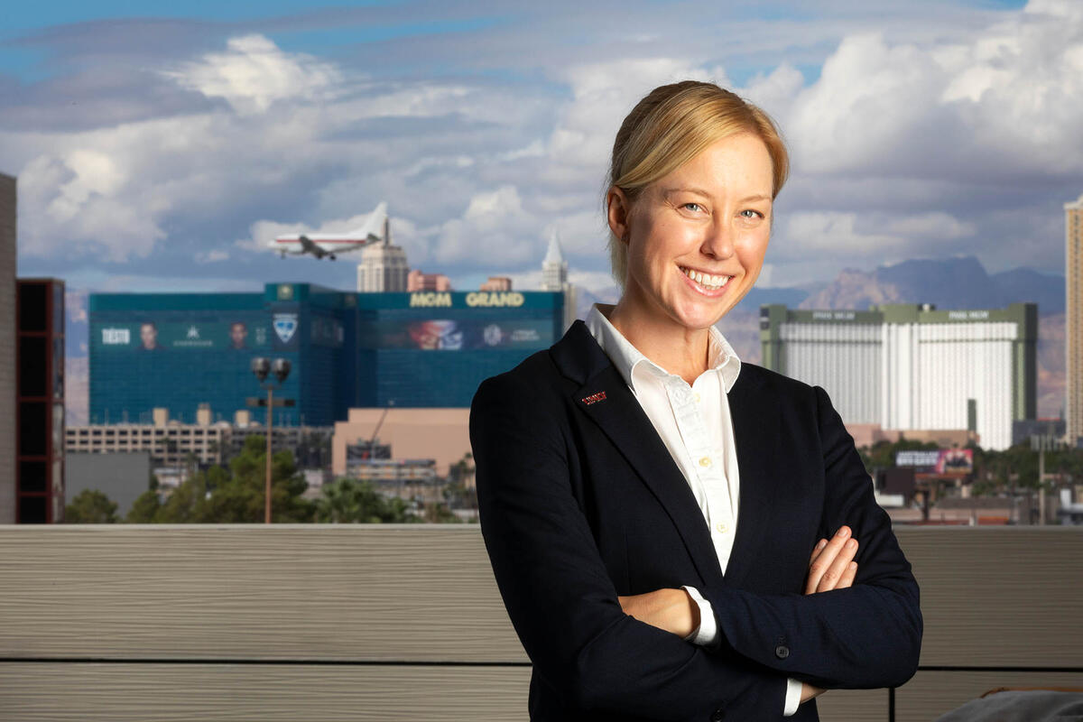 Katheryn "K.C." Brekken, Assistant Research Professor for the School of Public Policy and Leadership and MGM Resorts International Institute at UNLV poses in front of the Las Vegas Strip.