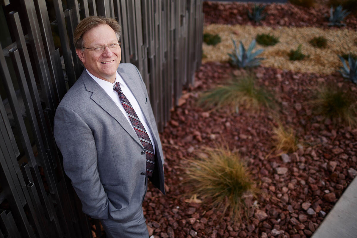 Tim Durnford poses in front of UNLV's Hospitality College.