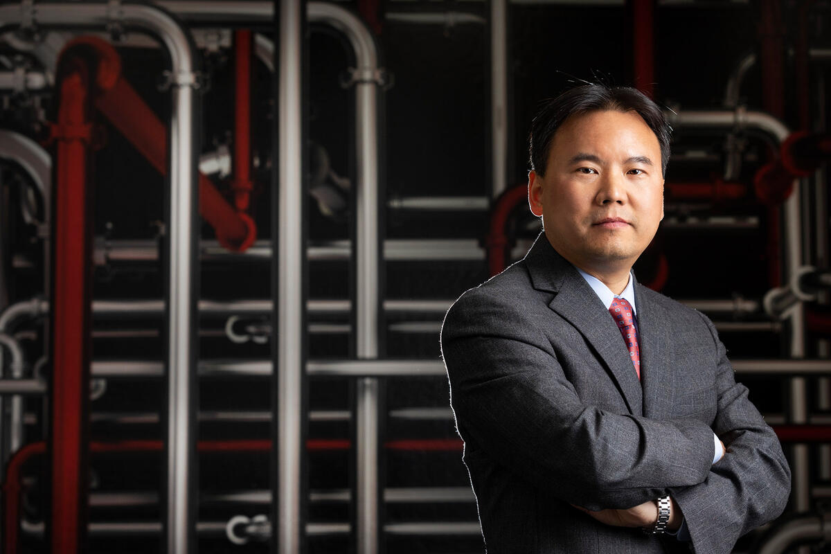 Yong Li poses for a photograph on UNLV's campus.