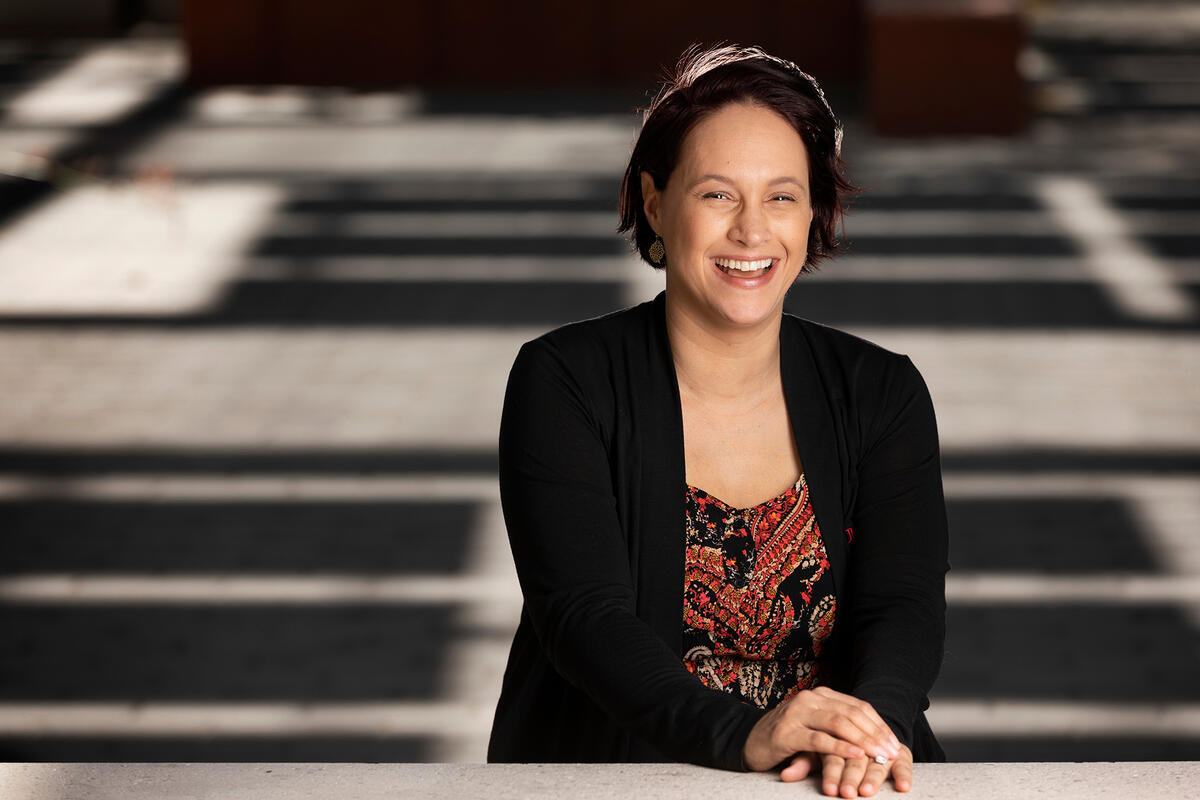 Portrait of woman seated outdoors