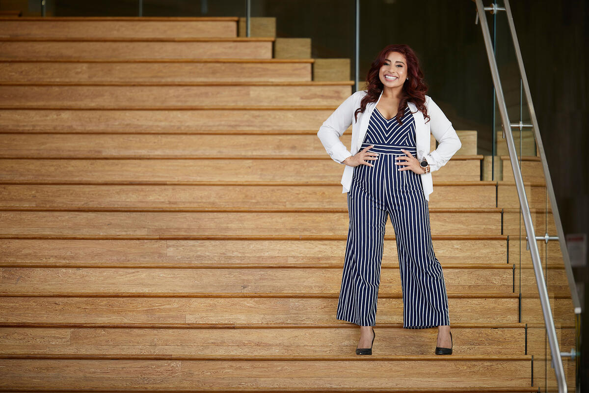 woman posing on staircase