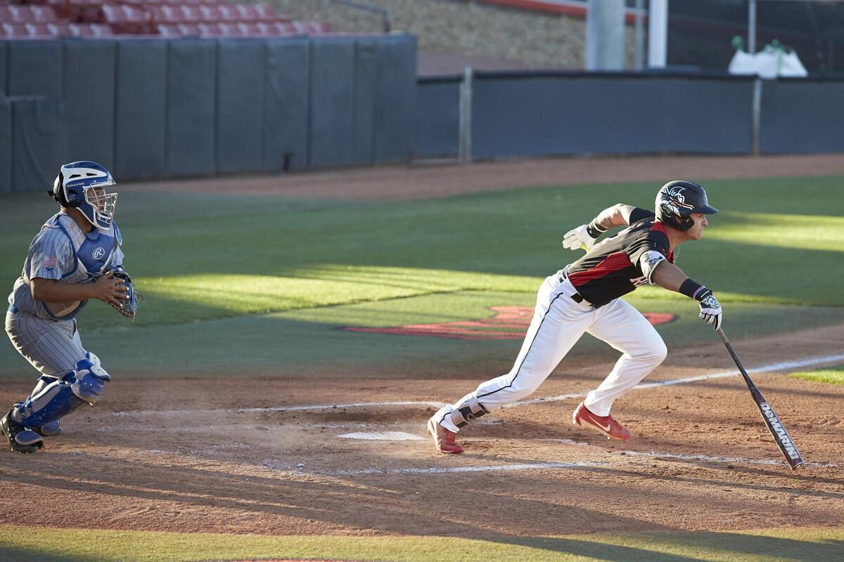 batter running after hitting the ball