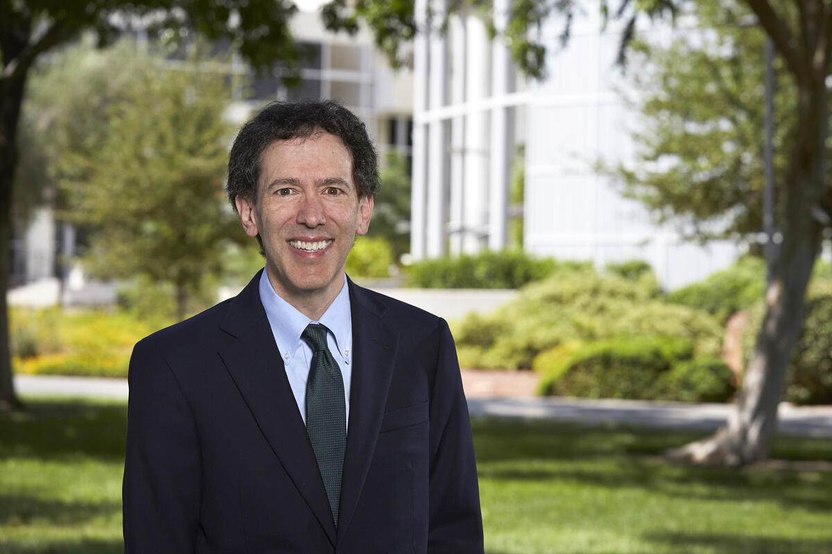 man in suit outside law building