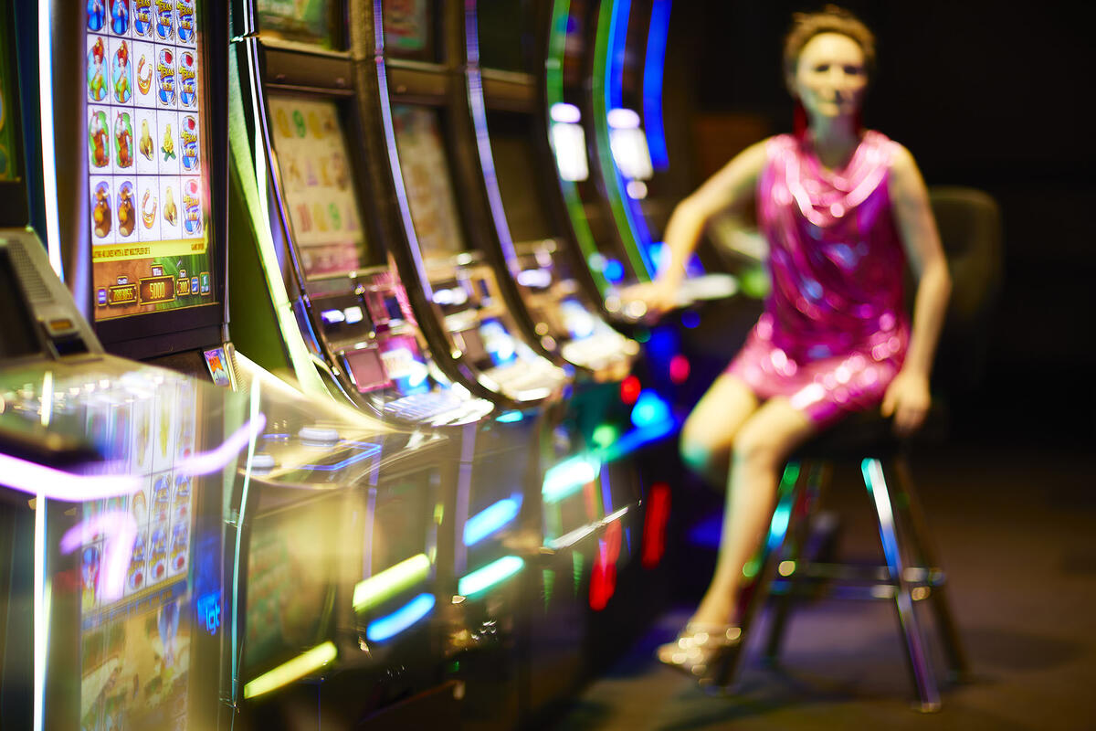 woman leaving slot machines