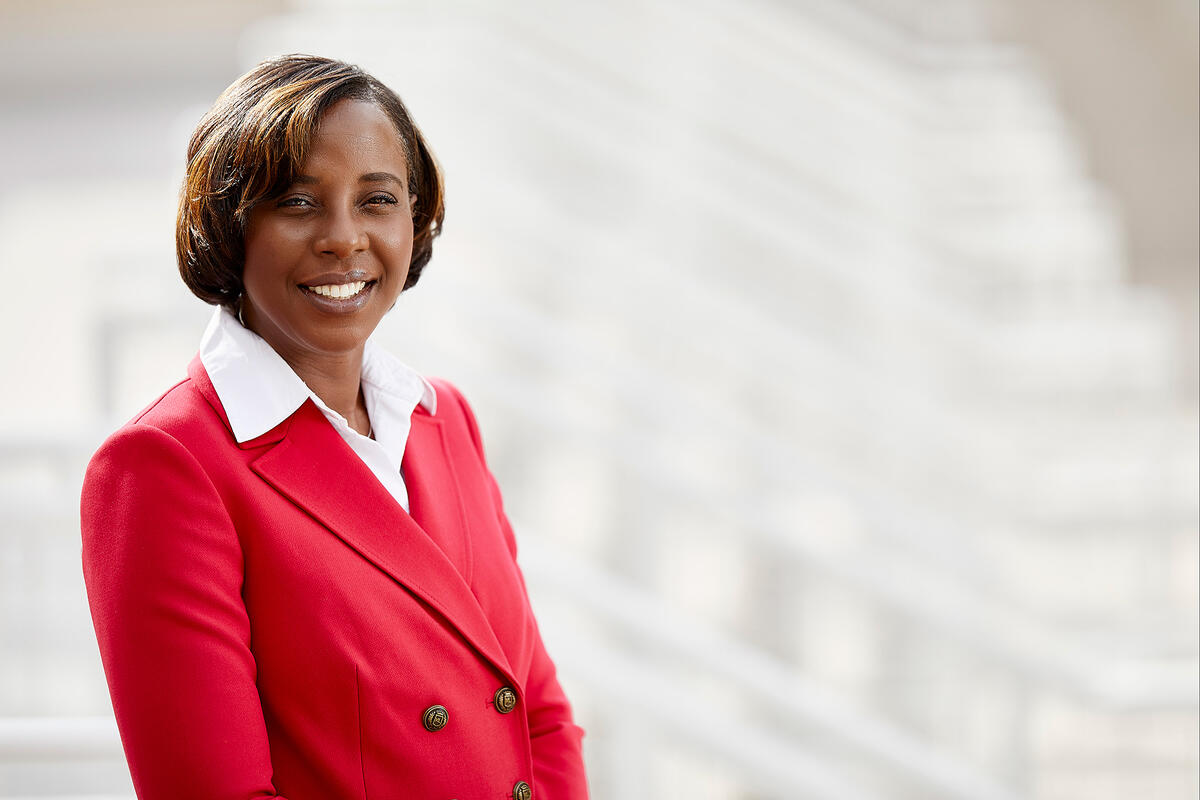 Portrait of Ericka Smith, seen standing on campus