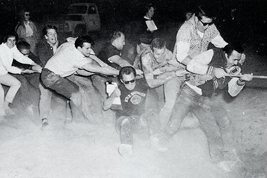 Students in a tug-of-war