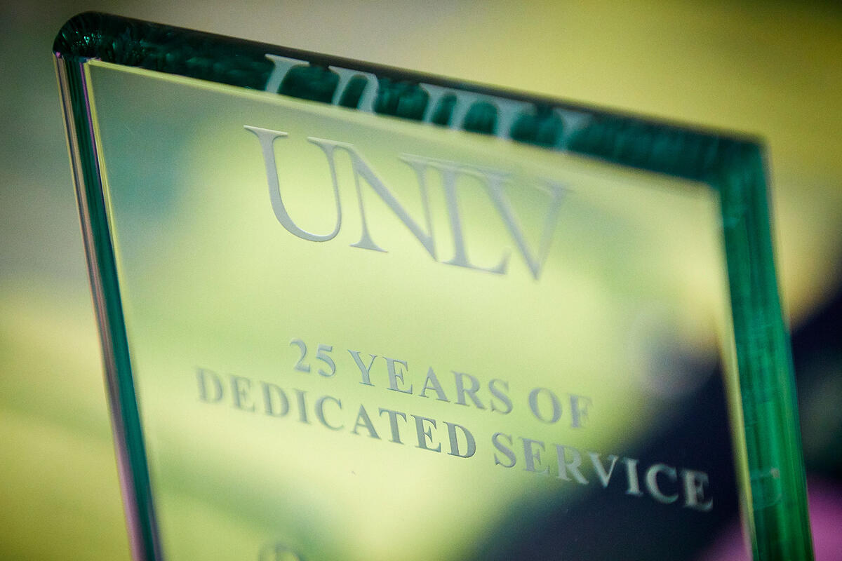Glass award plaque of UNLV for 25 years of dedicated service