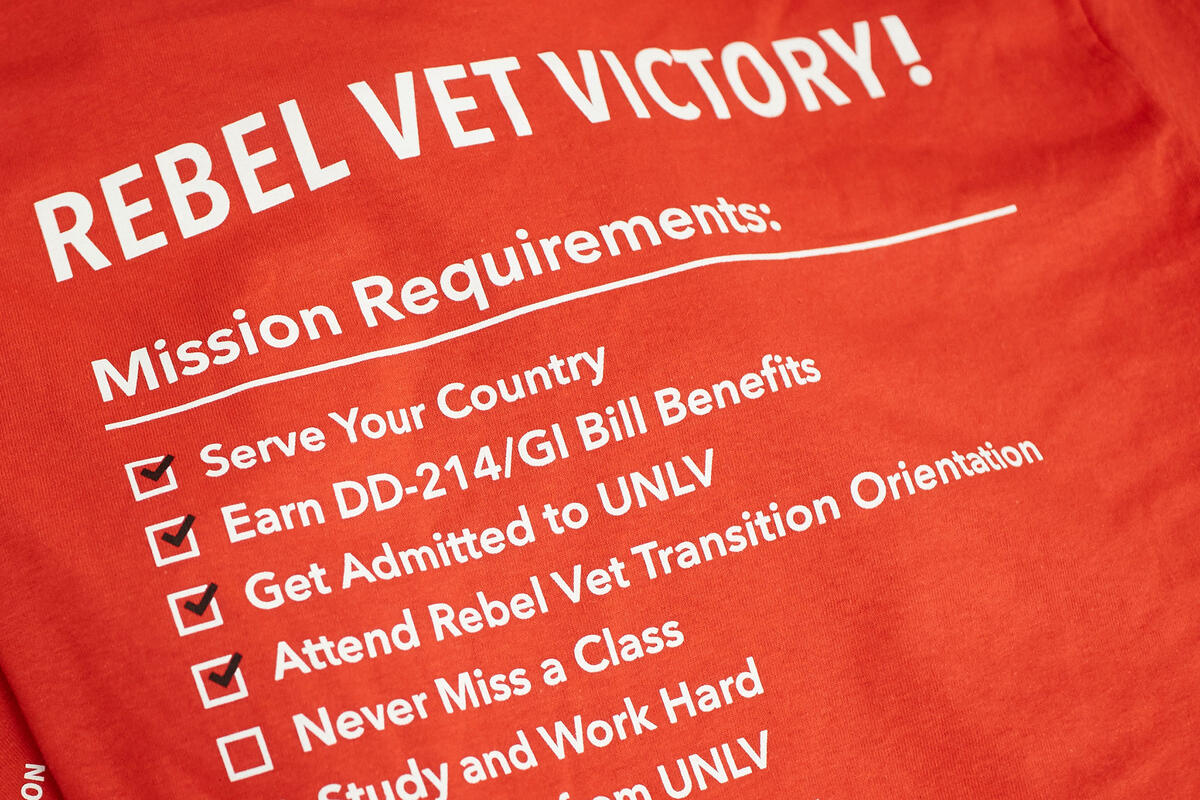 The back of a shirt that has the Rebel Vet Mission Requirements on it