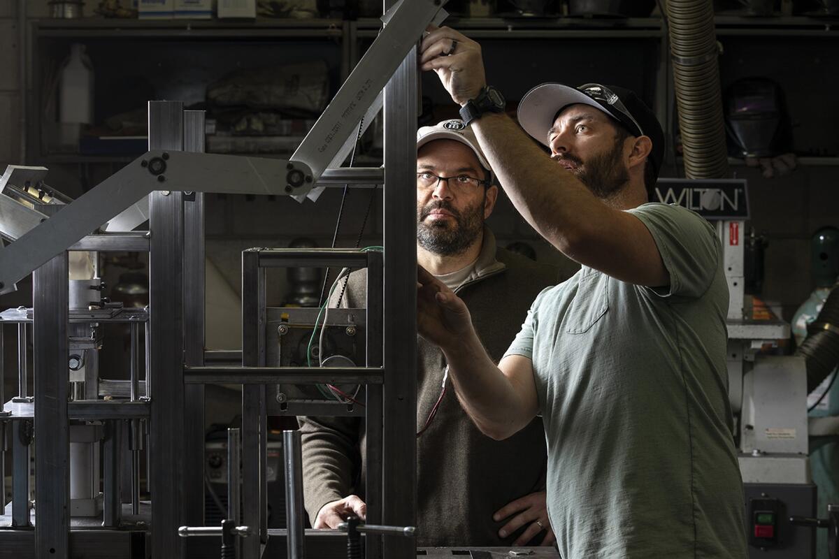 Men working on equipment