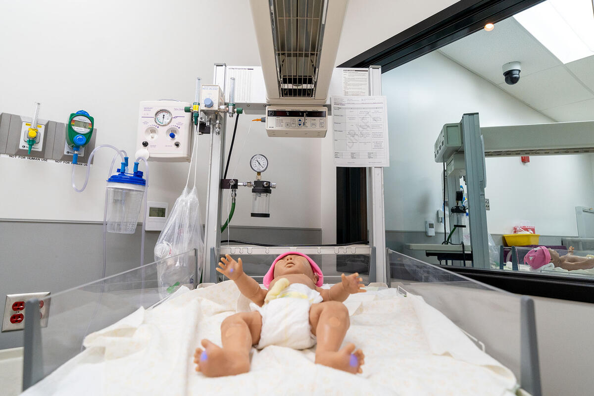 Simulation baby manikin in a newborn intensive care unit.