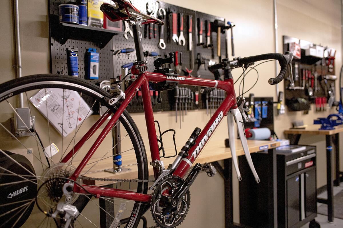 A bike in the shop having maintenance done.