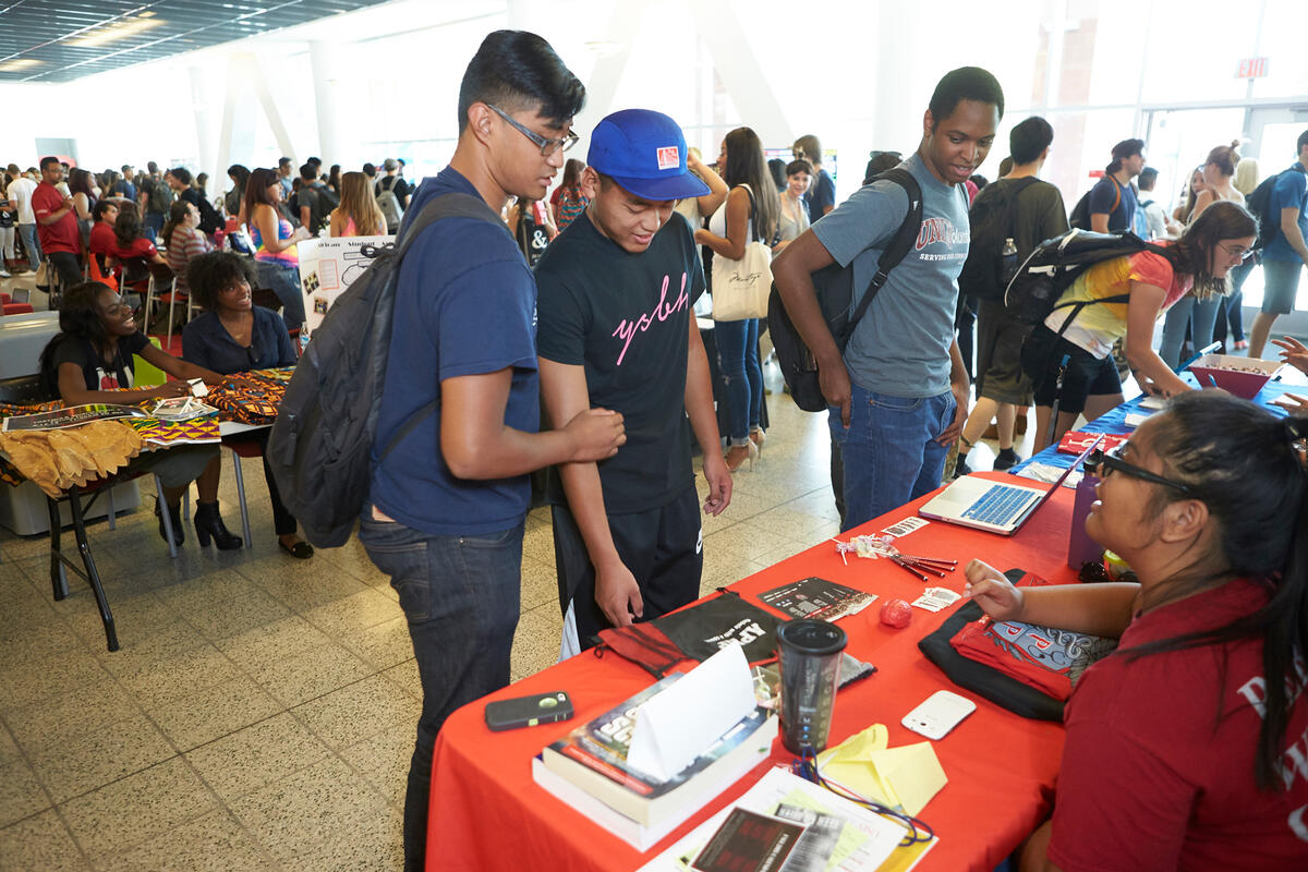 Students gathered at a table in Student Union.