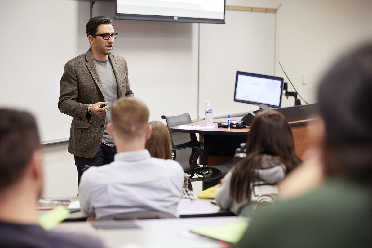 An instructor talking to his class.