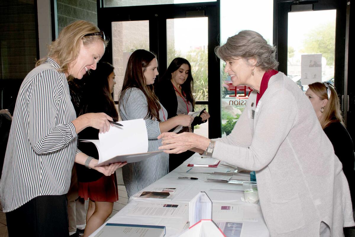 Women discussing at a table