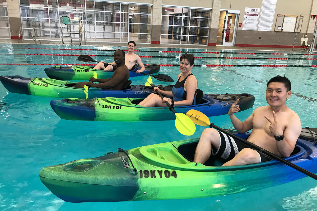 A group of people on kayaks.