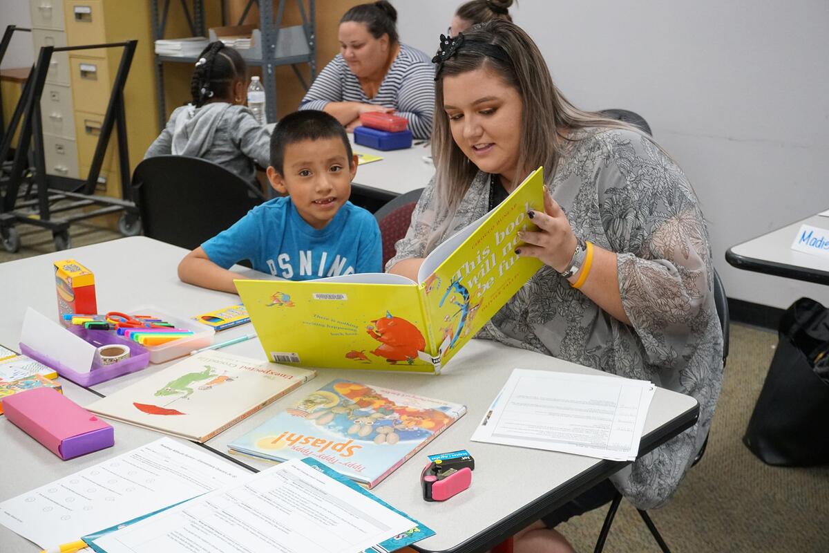 A UNLV student reads with a Paradise Elementary School Student during a Zeiter Literacy Center-sponsored tutoring session.