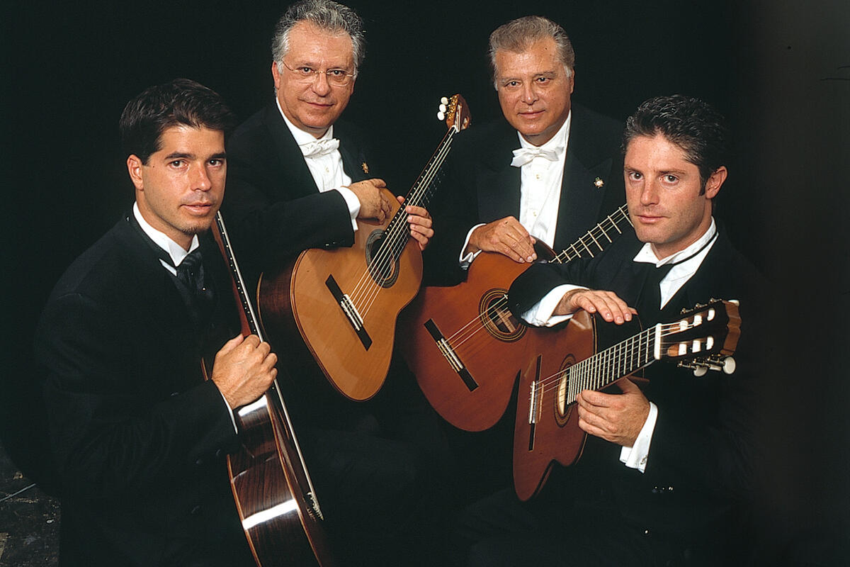 guitar quarter in formal attire