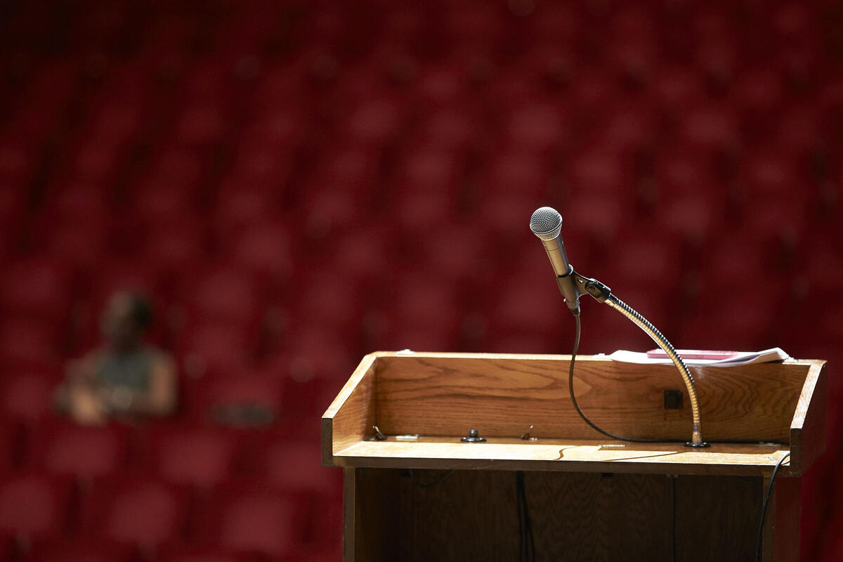 A podium with a microphone.