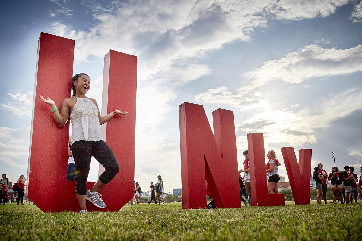 students in front of UNLV sign