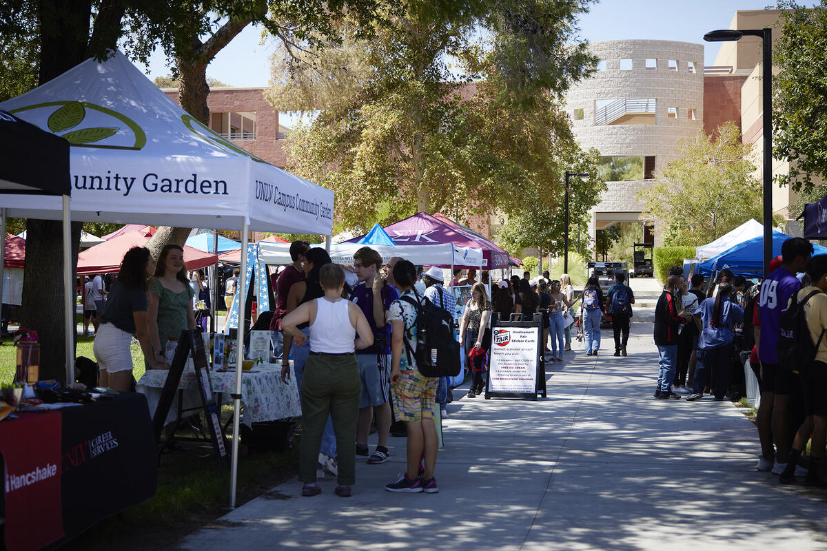 Large group of tents and students at the involvement fair