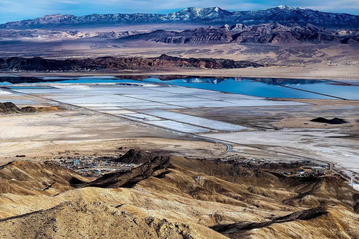 lithium mine pools with mountains in background