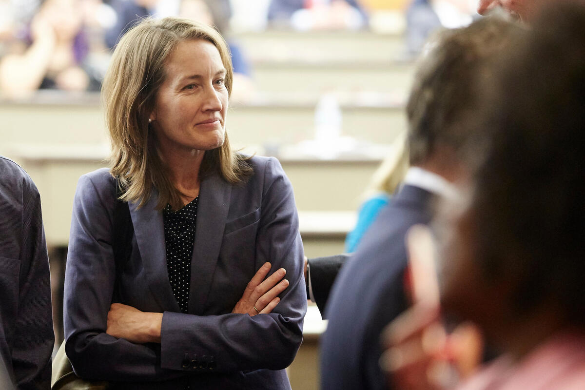 woman with arms crossed to chest