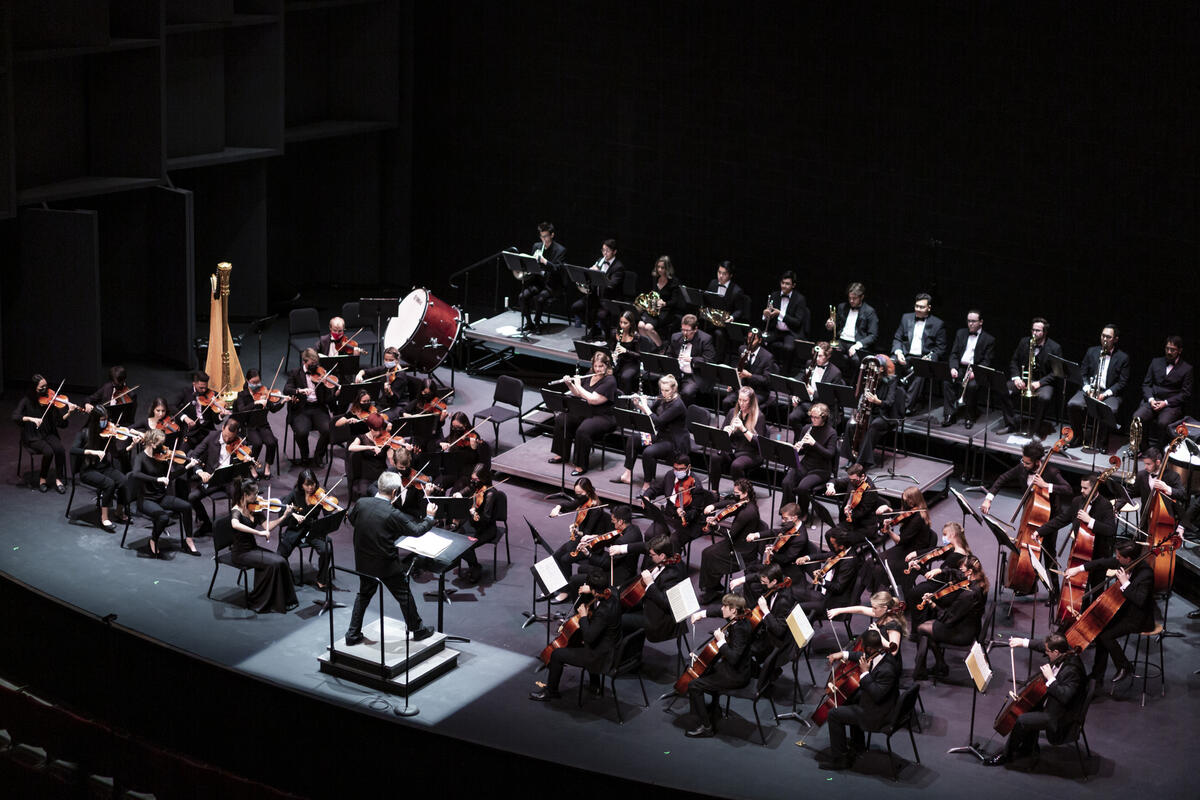 faraway shot of an orchestra performing