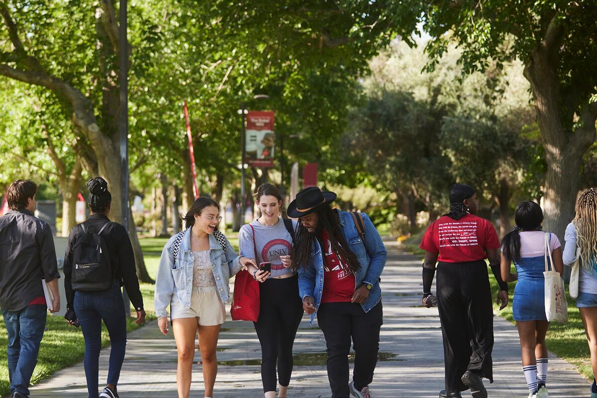 Students walking together outside on campus