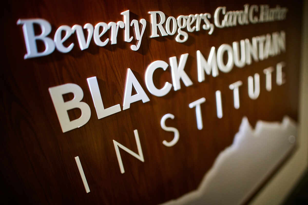 sign that reads black mountain institute