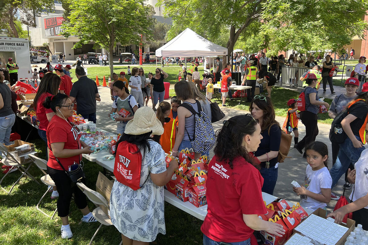 outdoor potluck with visitors and people in UNLV