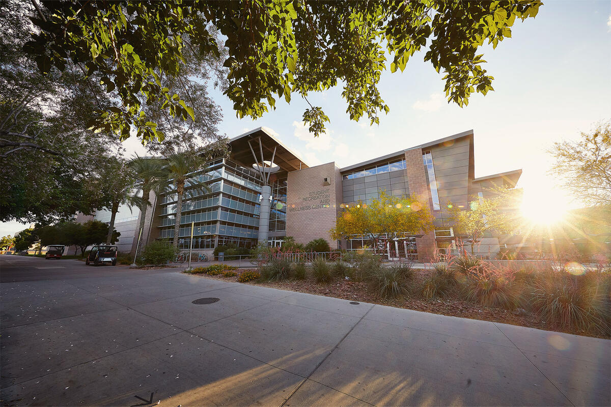 A landscape photo of the front exterior of the Student Recreation and Wellness Center