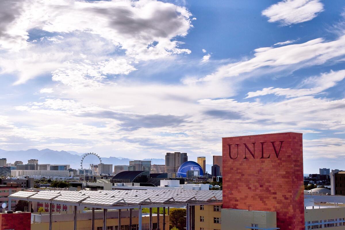 Las Vegas skyline with UNLV Greenspun Hall in the forefront.